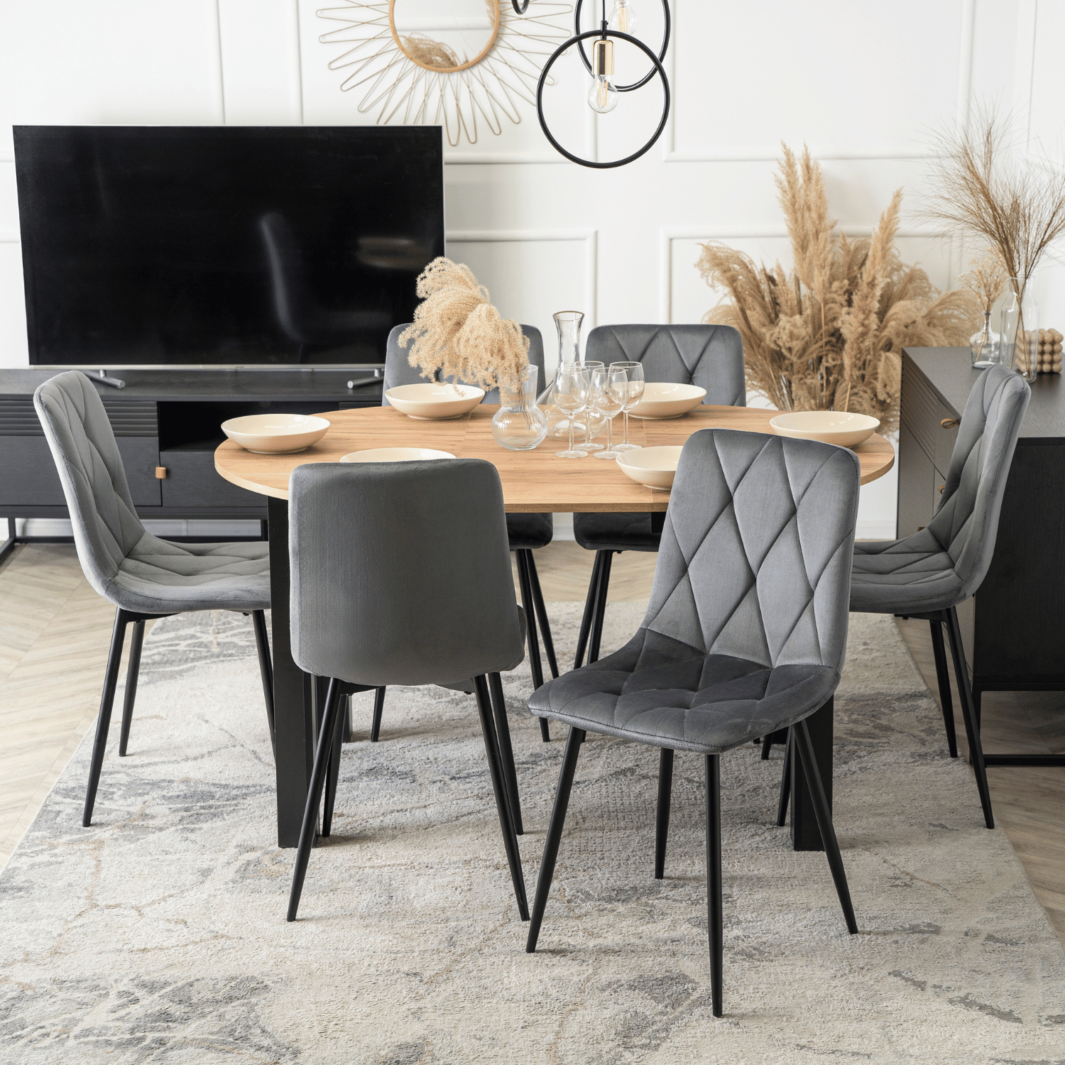 Zestaw Stół Okrągły Rozkładany HARRY 102-142 cm Dąb Craft/Czarny i 6 Krzeseł Tapicerowanych ROBIN Szarych Nowoczesnych W.HARRY/DC/CZ/S/ROBIN/P/V/Z6/K