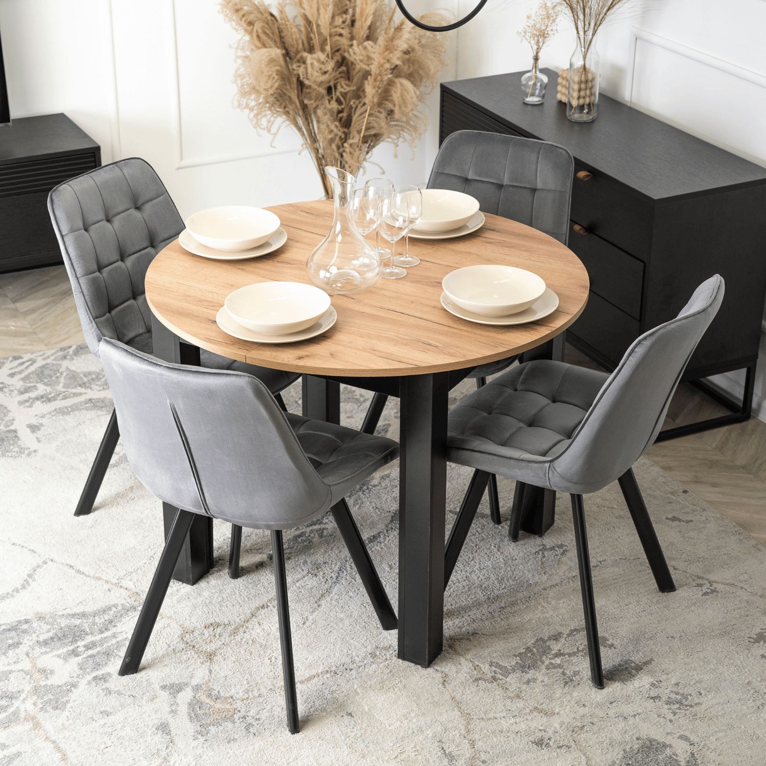 Zestaw Stół Okrągły Rozkładany HARRY 102-142 cm Dąb Craft/Czarny i 4 Krzesła Tapicerowane RICK Szare Nowoczesne W.HARRY/DC/CZ/S/RICK/P/V/Z4/K