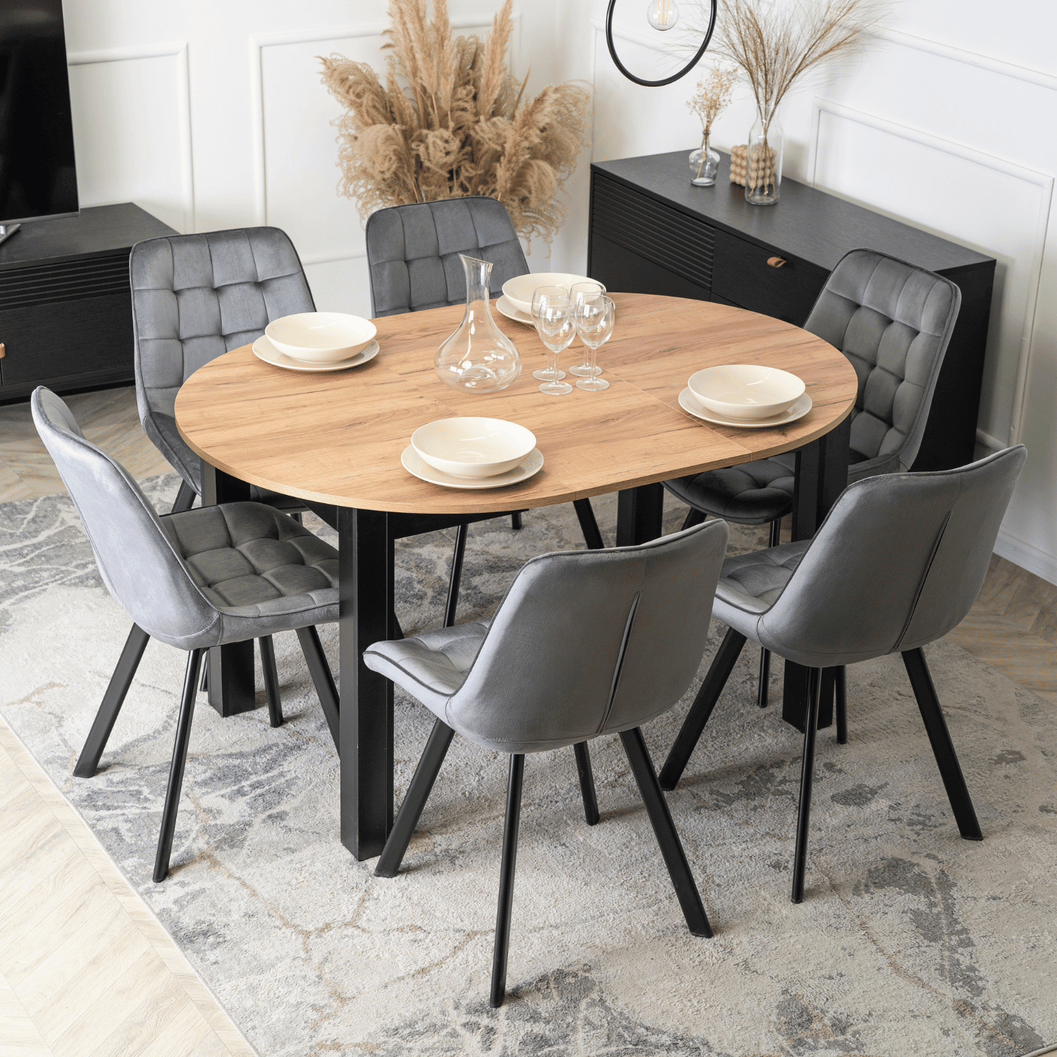 Zestaw Stół Okrągły Rozkładany HARRY 102-142 cm Dąb Craft/Czarny i 6 Krzeseł Tapicerowanych RICK Szarych Nowoczesnych W.HARRY/DC/CZ/S/RICK/P/V/Z6/K