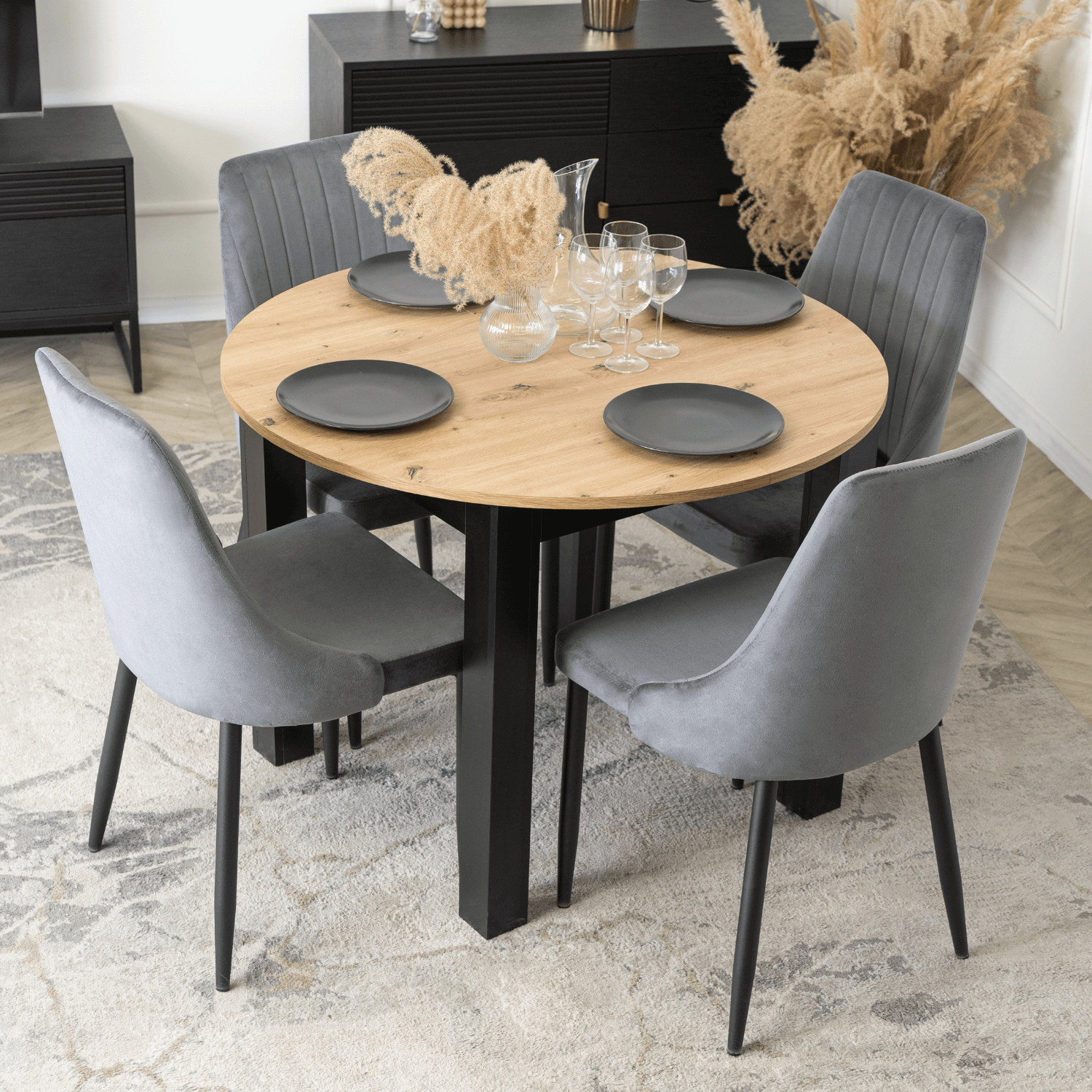 Zestaw Stół Okrągły Rozkładany HARRY 102-142 cm Dąb Artisan/Czarny i 4 Krzesła Tapicerowane BARI Szare Nowoczesne W.HARRY/DA/CZ/S/BARI/P/V/Z4/K