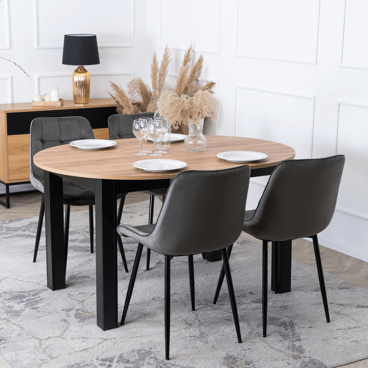 Zestaw Stół Okrągły Rozkładany HARRY 102-142 cm Dąb Craft/Czarny i 4 Krzesła Tapicerowane CHRIS Szare Nowoczesne W.HARRY/DC/CZ/S/CHRIS/P/CZ/V/Z4/K