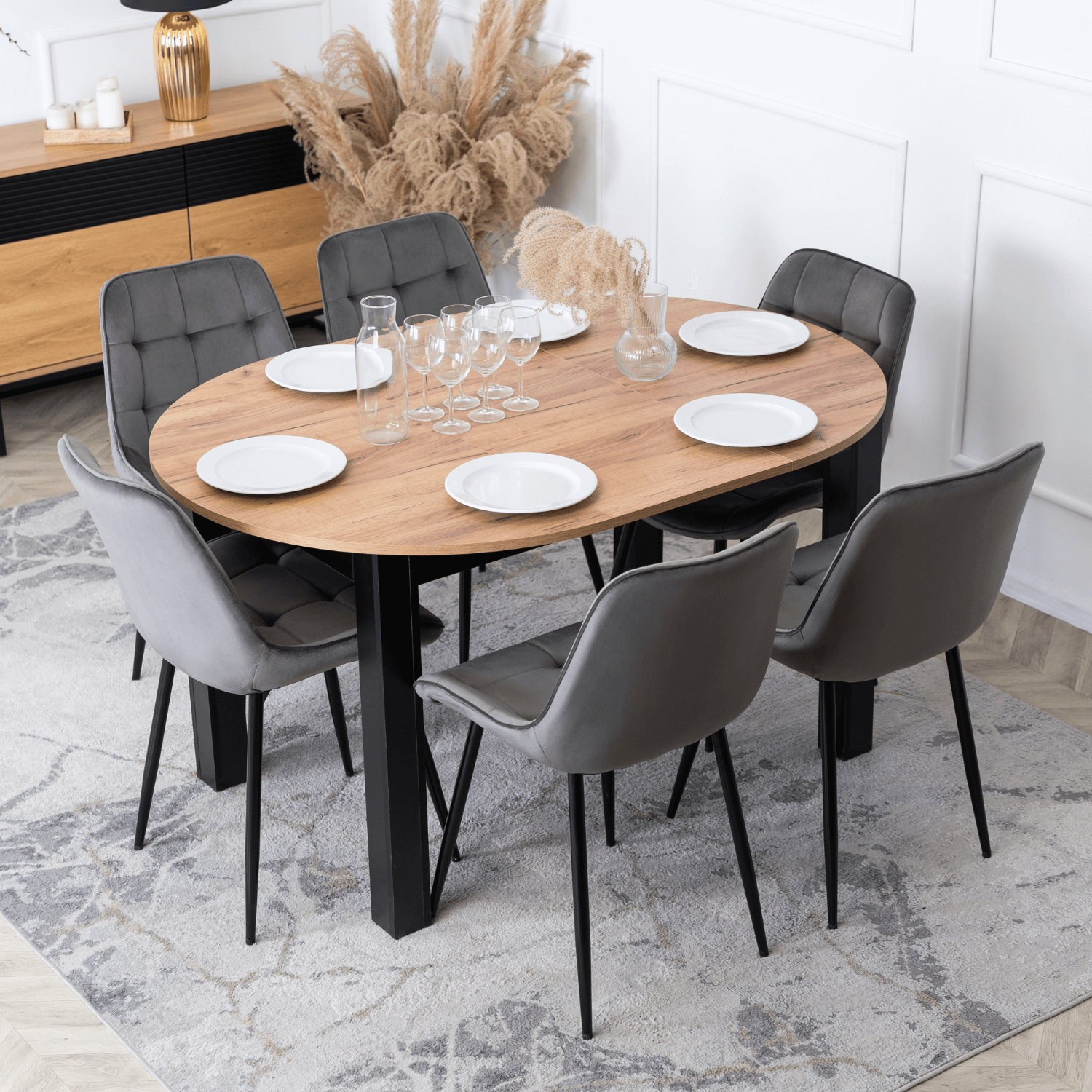Zestaw Stół Okrągły Rozkładany HARRY 102-142 cm Dąb Craft/Czarny i 6 Krzeseł Tapicerowanych CHRIS Szarych Nowoczesnych W.HARRY/DC/CZ/S/CHRIS/P/CZ/V/Z6