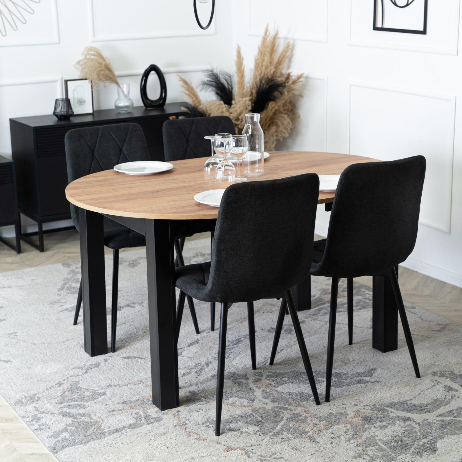 Zestaw Stół Okrągły Rozkładany HARRY 102-142 cm Dąb Craft/Czarny i 4 Krzesła Tapicerowane ROBIN 2 Czarne Nowoczesne W.HARRY/DC/CZ/S/ROBIN2/CZ/T/Z4/K